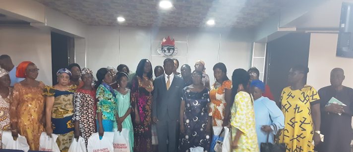 Distribution of food for the widows and needy during Easter Celebration.